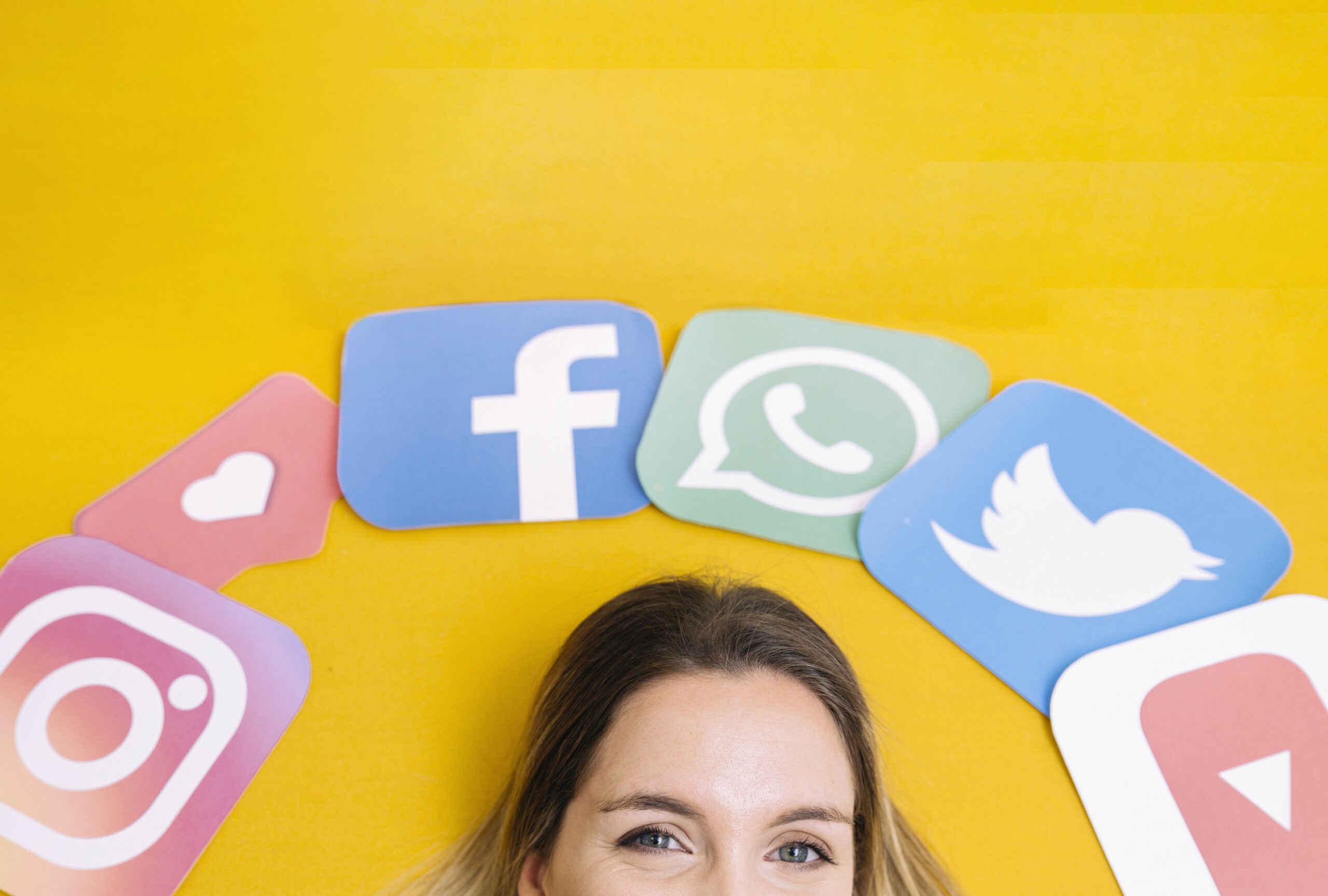 social-media-application-icons-woman-s-head-yellow-backdrop